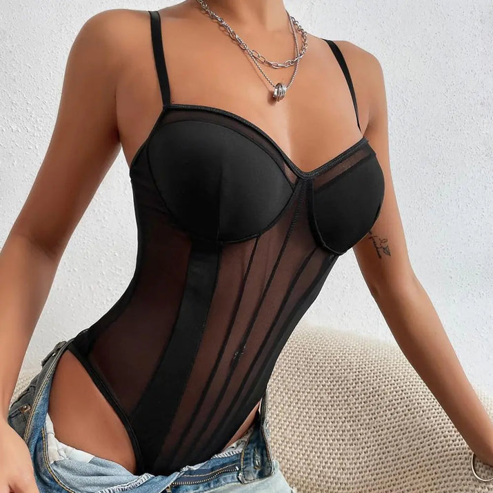 Black sheer bodysuit worn by a person on a neutral background