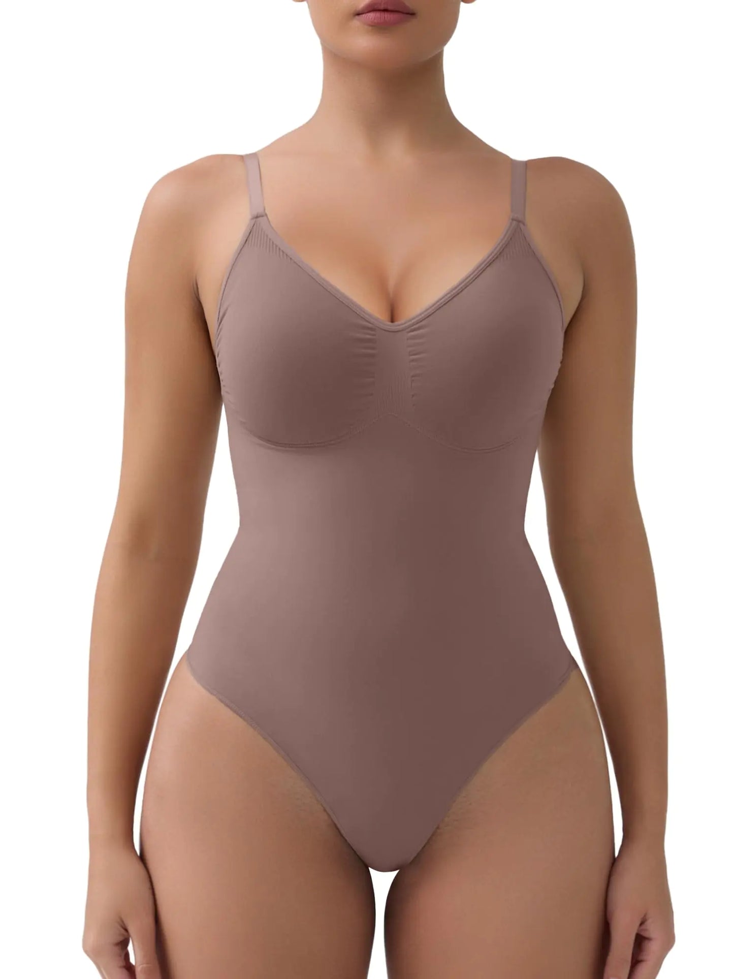 Brown bodysuit worn by a model on a white background