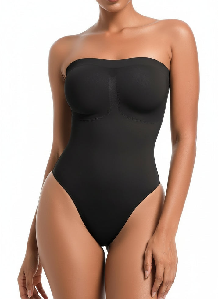 Black strapless bodysuit worn by a model on a white background
