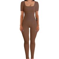Brown bodysuit worn by a model on a white background