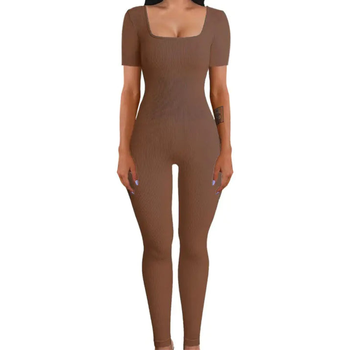 Brown bodysuit worn by a model on a white background